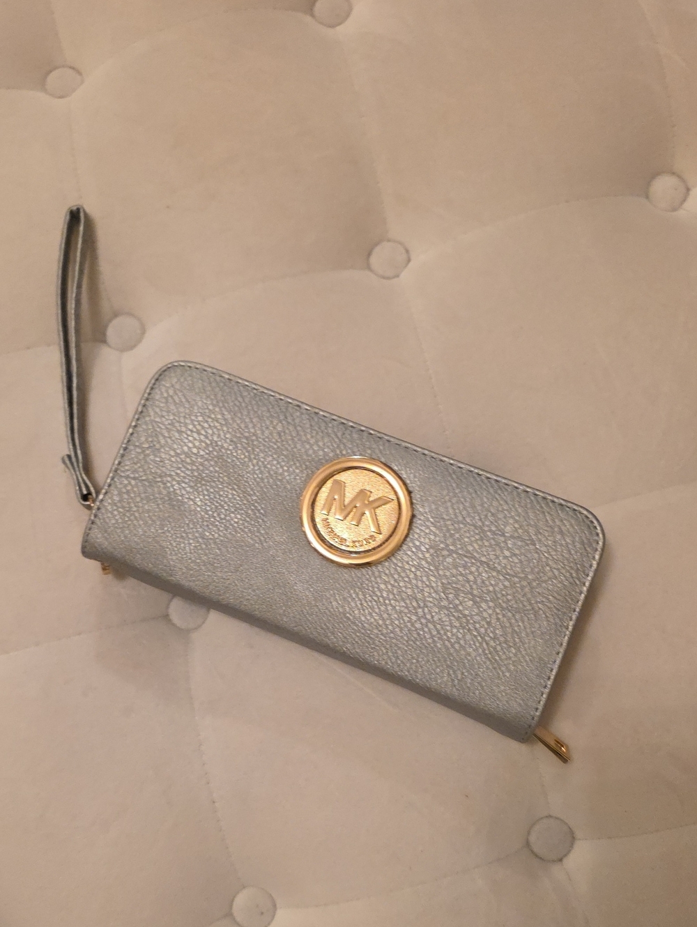 Michael Kors Silver-Gray Zip Around Wristlet Wallet with Gold MK Emblem